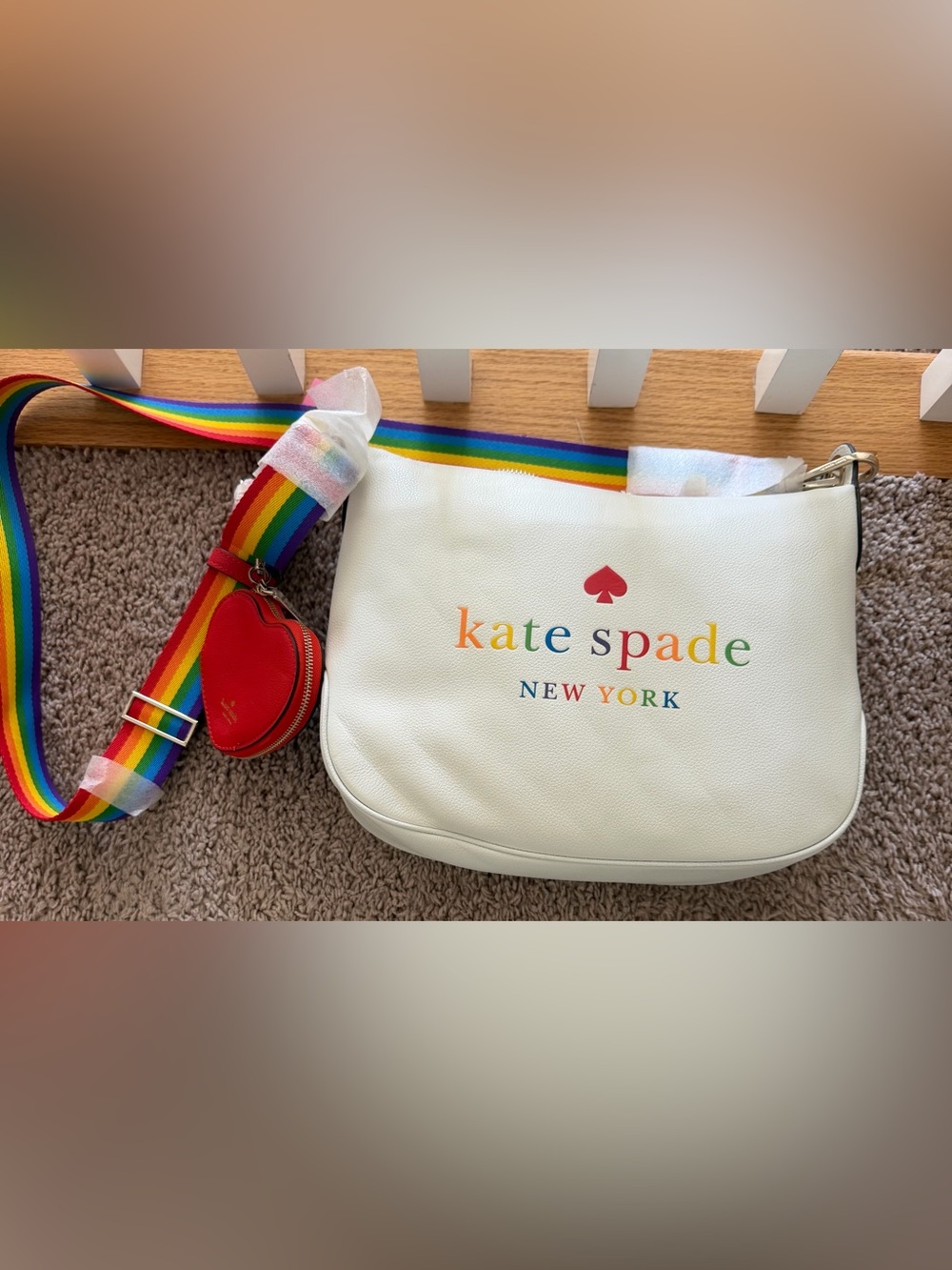 kate spade white shoulder bag with rainbow strap